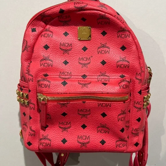 MCM Stark Backpack in a Hot Pink Visetos coated canvas with stud embellishments MCM Pink Visetos Coated Canvas Small Studs Stark Backpack  main image 2